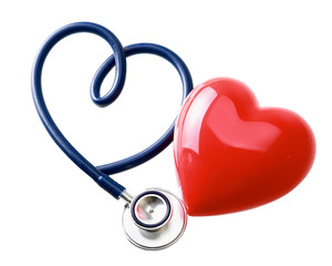 Medical stethoscope and heart isolated on white