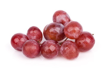fresh red grape isolated on white.
