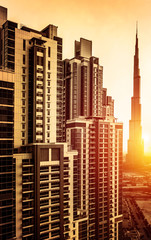 Naklejka premium Dubai downtown in sunset