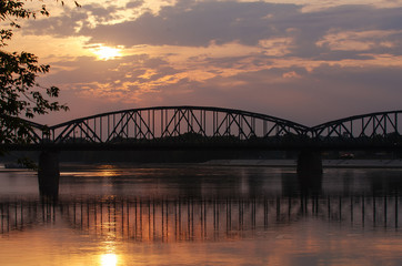 Fototapeta na wymiar Marshall Pilsudski Bridge over Vistula river (Torun, Poland)