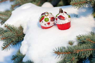 christmas toy cakes on winter tree with snow