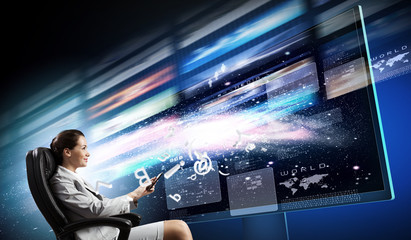 Young businesswoman in chair