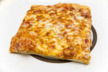 piece of pizza with cheese and ham