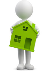 Männchen trägt grünes Haus Symbol