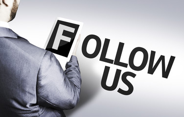 Business man with the text Follow Us