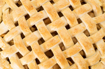 Baked apple pie closeup studio shot showing the crust