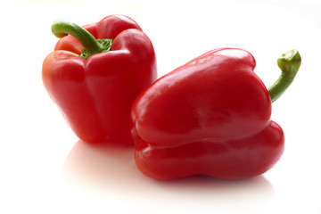 two red peppers, isolated