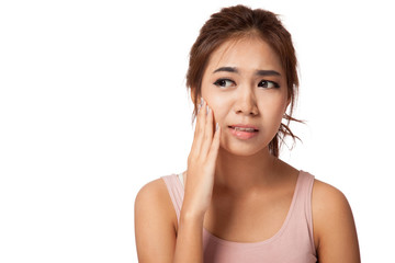 Pretty Asian girl has toothache