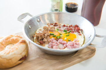 Breakfast - fried eggs, ham, bacon, pork and bread