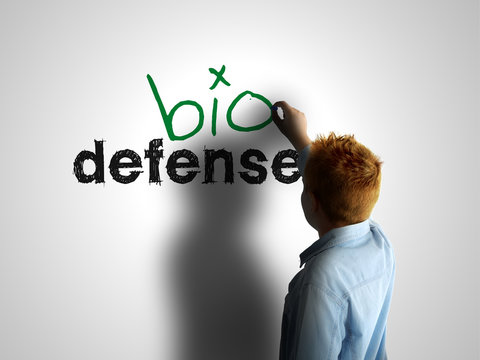 Bio defense. Boy writing on a white board