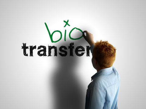 Bio transfer. Boy writing on a white board