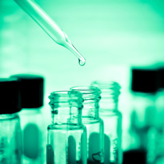 Laboratory research, dropping liquid to test tube