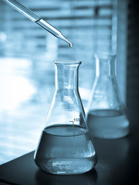 Laboratory research, Flask containing chemical liquid