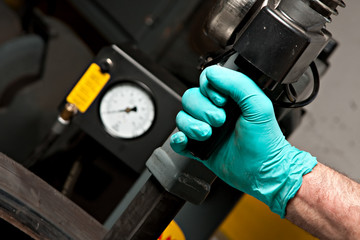 Mechanical repairs a tire.