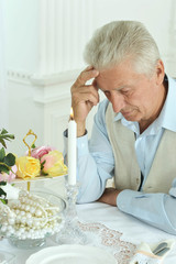 Pensive elderly man