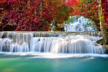 Fototapeta na wymiar Beautiful waterfall in autumn forest