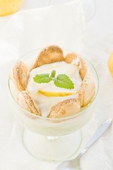 Dessert with pears, creamy cream and cookies