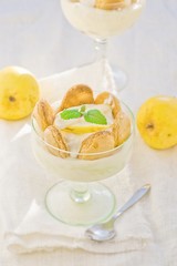 Dessert with pears, creamy cream and cookies