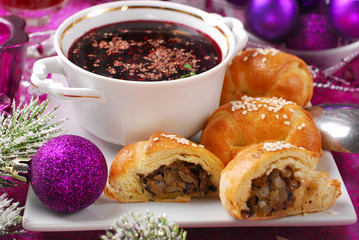 red borscht and pastries with mushrooms for christmas