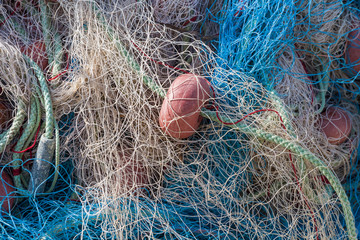 Fototapeta na wymiar Stack of fishing nets