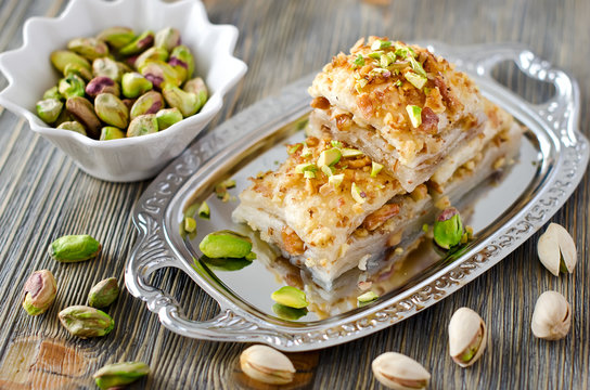 Eastern sweets with pistachios  baklava with green pistachios on