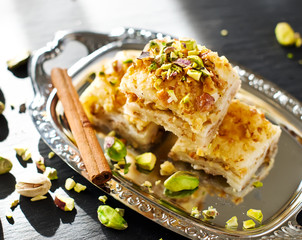 Turkish pistachio pastry dessert  baklava with green pistachios