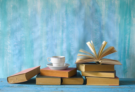 vintage books with a cup of coffee , free copy space