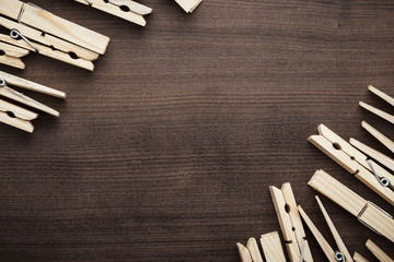 wooden clothes pegs on the table