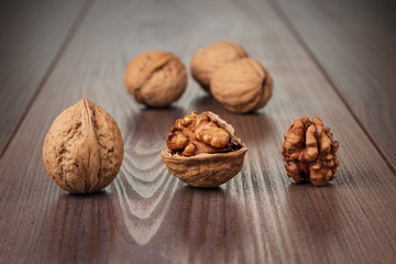 walnuts on the brown wooden table