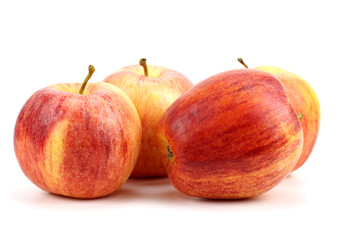 Fresh red apples isolated over white background
