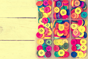 Fototapeta premium Box of olorful sewing buttons