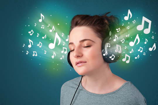 Young woman with headphones listening to music