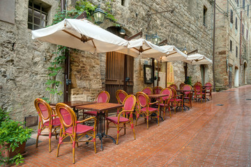 Alley in Italian old town San Gimignano Tuscany Italy - obrazy, fototapety, plakaty