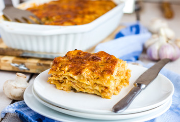 piece of meat lasagna with mushrooms, Italian cuisine