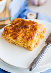 piece of meat lasagna with mushrooms, Italian cuisine