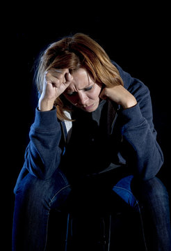 close up woman suffering depression and stress crying alone