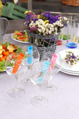 Buffet table with dishware waiting for guests