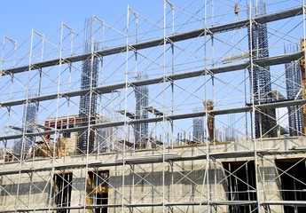 The construction site and steel frame in city