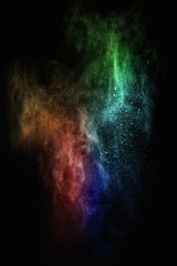 Obraz na płótnie Canvas Colourful powder exploding isolated on black