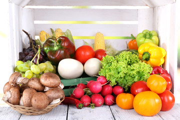 Vegetables on wooden table on white wooden box background
