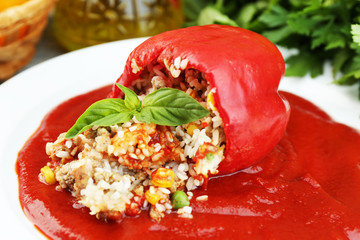 Prepared stuffed pepper with tomato sauce