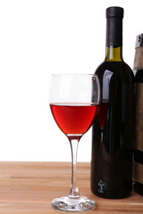 Wine in goblet and in bottle, grapes