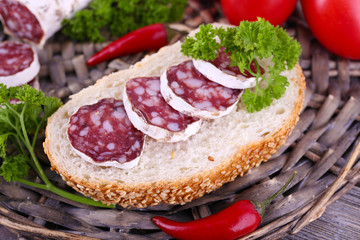 French salami with tomatoes, bread and parsley
