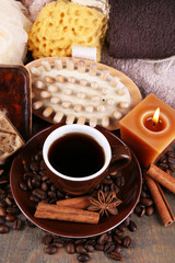Cup with coffee drink, soap with coffee beans and spices,