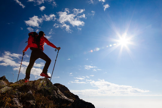 Hiker standing on the top of a mountain