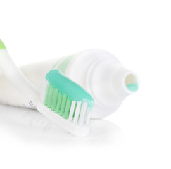 toothbrush with toothpaste isolated on white background