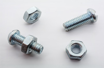 Macro Shot of Small Iron Screws And Nuts