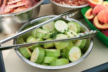 Foods are prepared for grilling