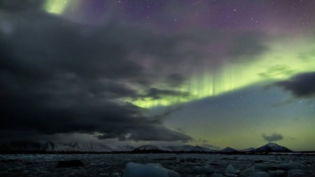 Northern lights behind the clouds