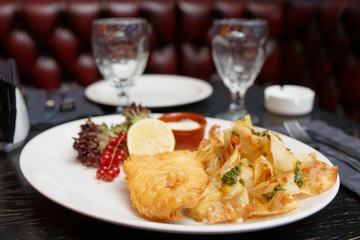 Fish and chips in plate